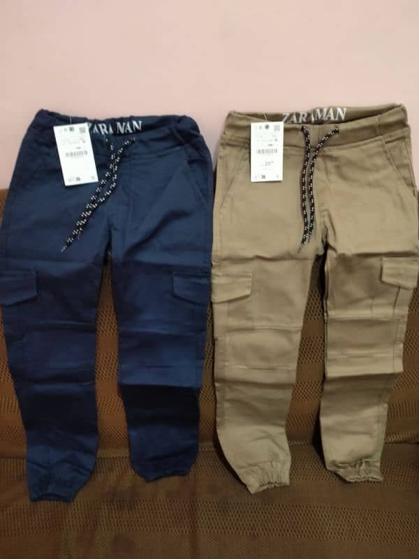 kids cargo trousers. 1