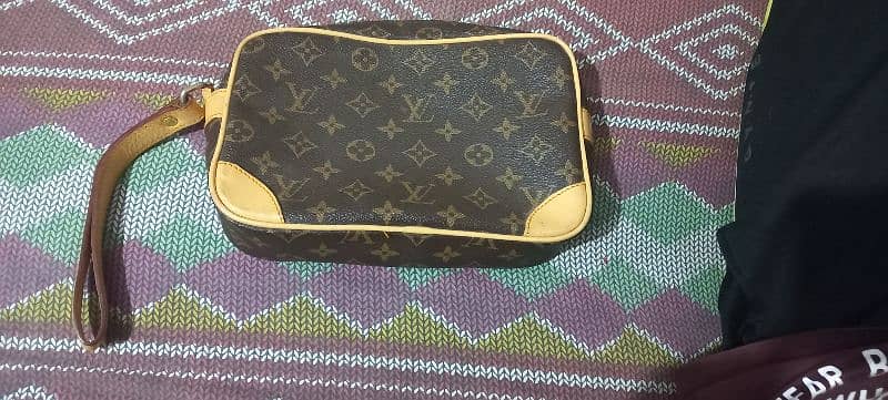 Vintage Authentic Louis Vuitton Marly Dragonne. . . 1