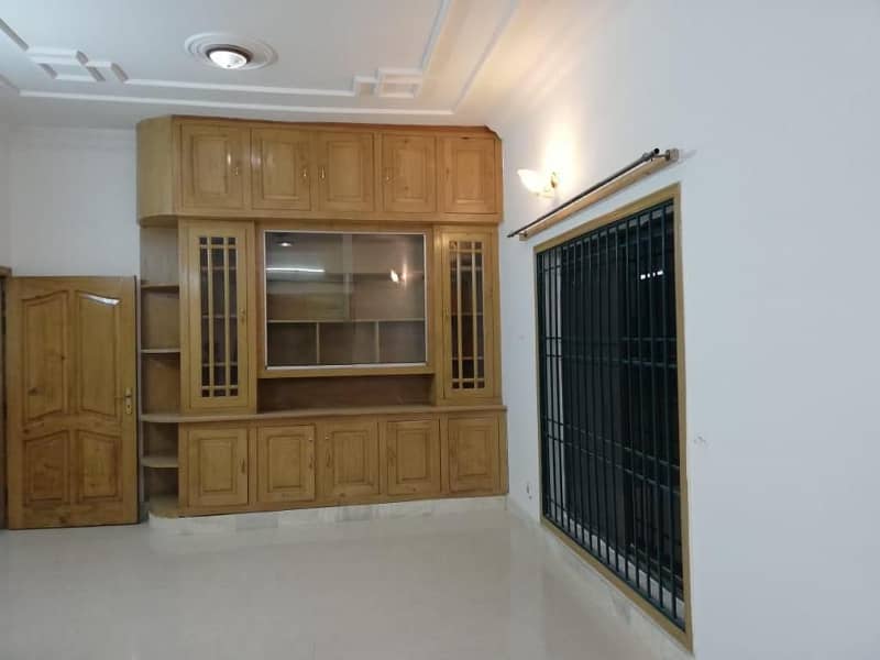 One Kanal Tile Flooring Separate Gate Ground Portion Is Available For Rent In I-8 Islamabad 0