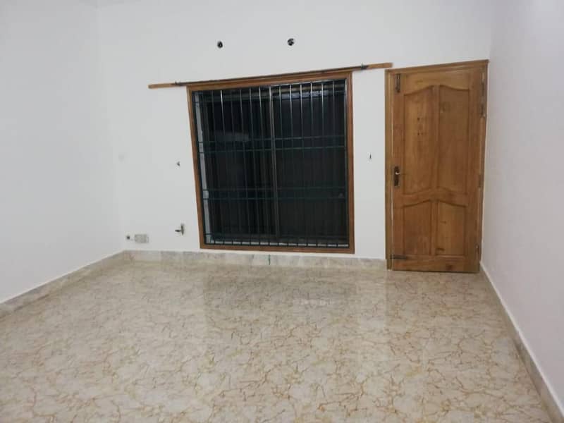 One Kanal Tile Flooring Separate Gate Ground Portion Is Available For Rent In I-8 Islamabad 8