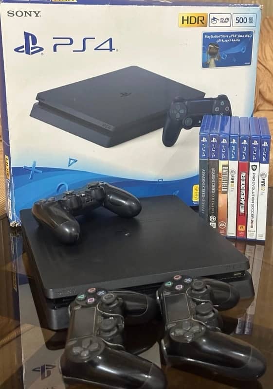 PS4 with 3 controllers and games 3