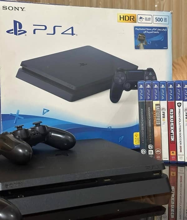 PS4 with 3 controllers and games 4