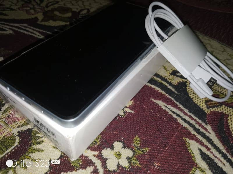 Samsung Galaxy a06 with charger 2