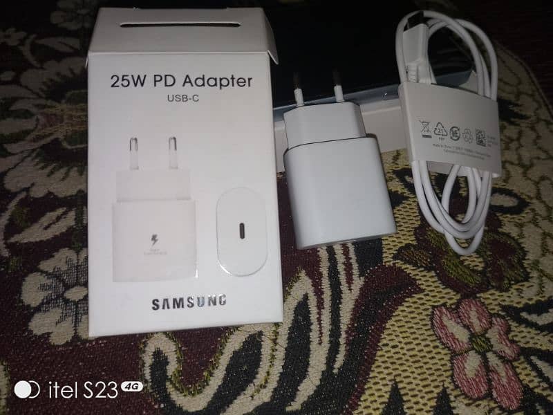 Samsung Galaxy a06 with charger 3