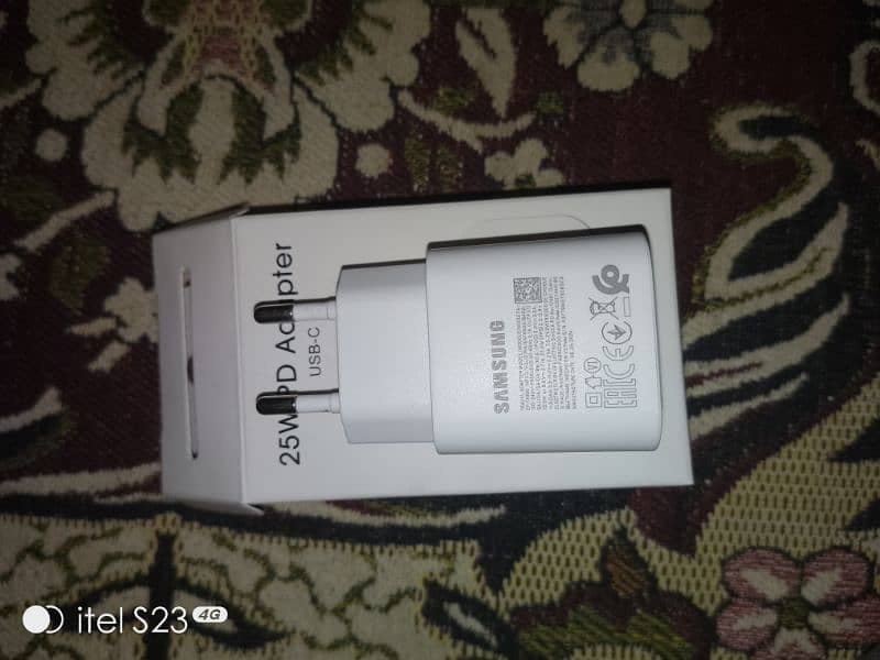 Samsung Galaxy a06 with charger 4