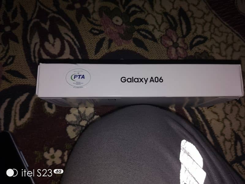 Samsung Galaxy a06 with charger 6