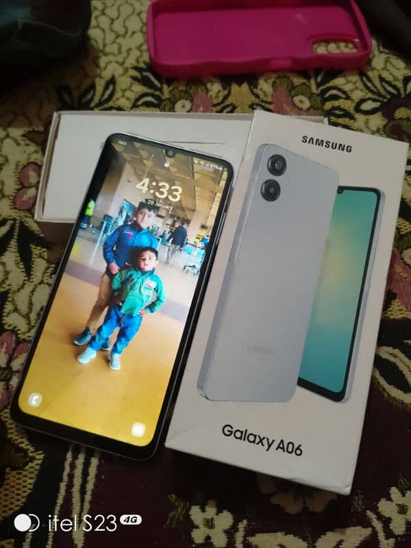 Samsung Galaxy a06 with charger 13