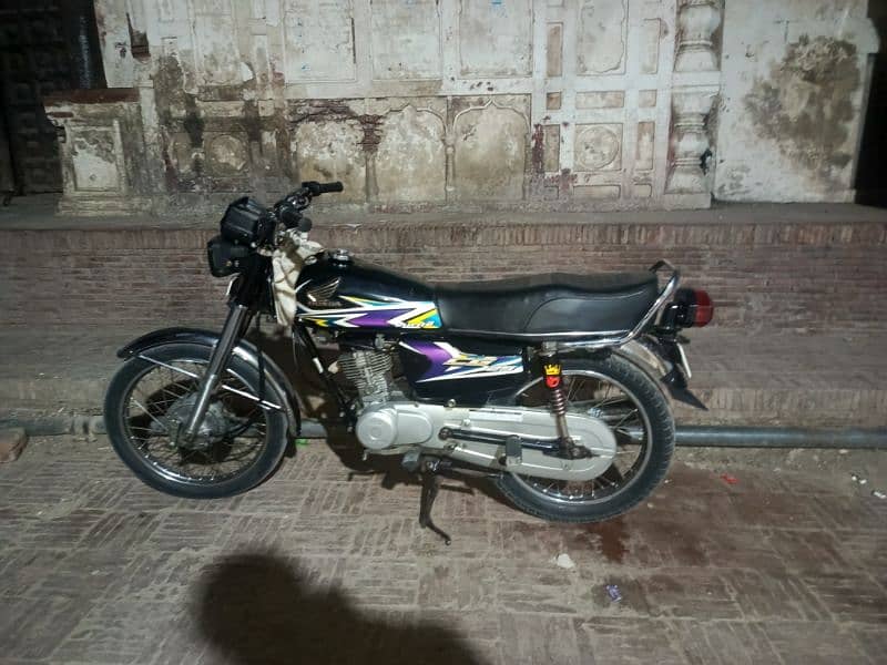 Honda 125 good condition only family use bike 2