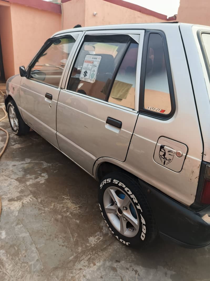 Mehran ha 2003 model outer 40 percentage inner tptal jeniun 1