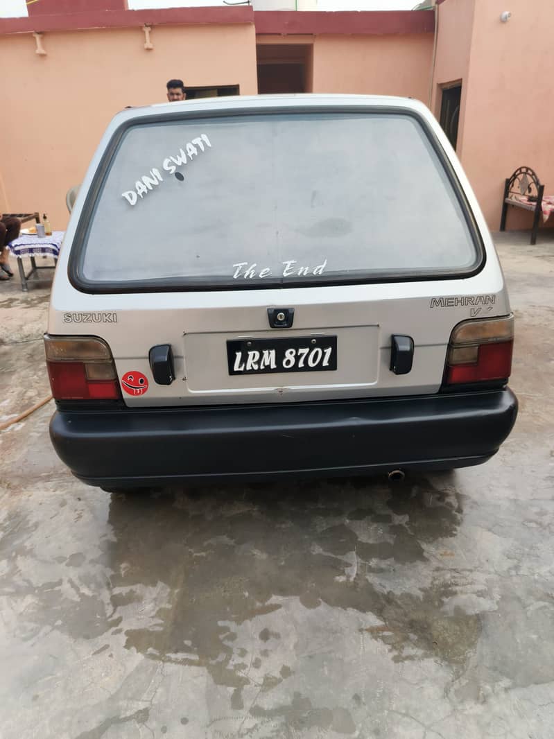 Mehran ha 2003 model outer 40 percentage inner tptal jeniun 2