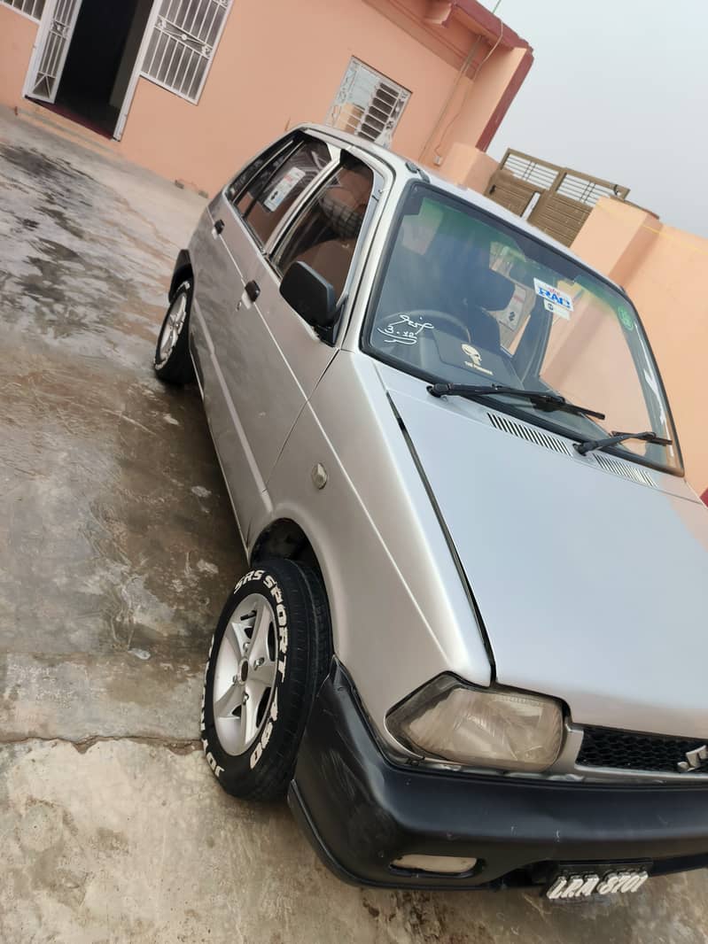 Mehran ha 2003 model outer 40 percentage inner tptal jeniun 3