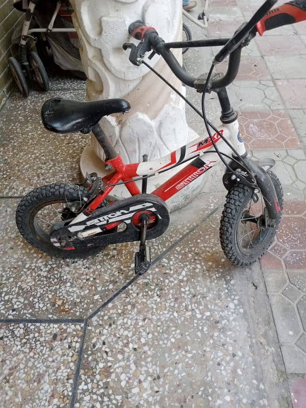 3 kids cycles and a pram in a very good condition 5