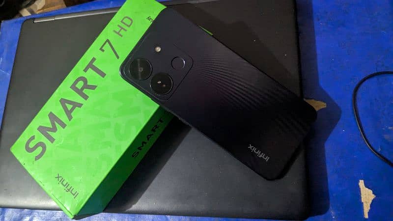 Infinix smart 7hd. 4/64  . (Total Jenioun) box and charger 0