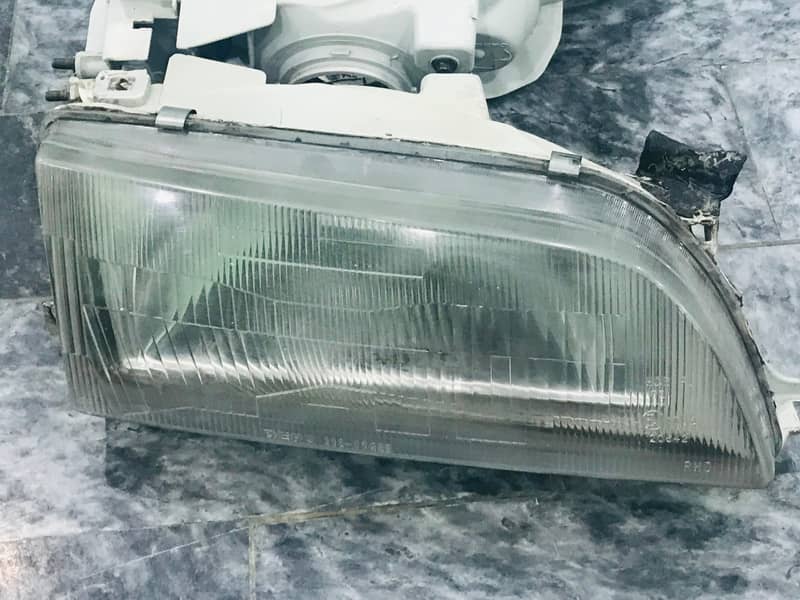 HEADLIGHTS MADE IN TAIWAN ORIGINAL DEPO COMPANY 94 INDUS CORLLA 4