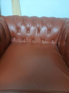 rust colour leather cover sofa