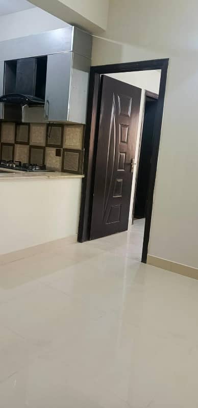 1 bed non furnished apartment available for rent in hulber green islamabad 9