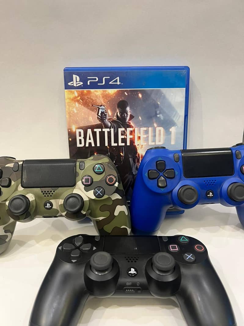 Used PS4 fat, 500GB, BattleFeild 1 disc, 3 controllers (Without box) 2