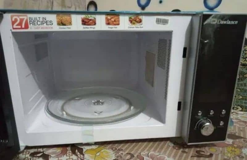 Dawlance microwave oven 131hp slightly used 2