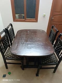 01 Dining table and 4 chairs are for sale in reasonable price