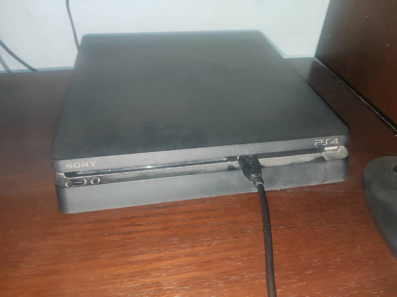 PS4 Slim 500GB with box and titles 2