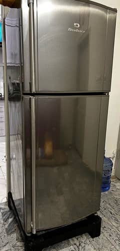 DAWLANCE FRIDGE FOR SALE with stand and stabilizer