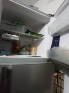 defrost Hitachi fridge