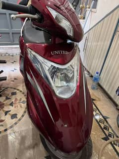 united scooty 100cc