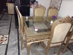 dinning table new model + 6 wooden chairs bilkul new halat. ma hy