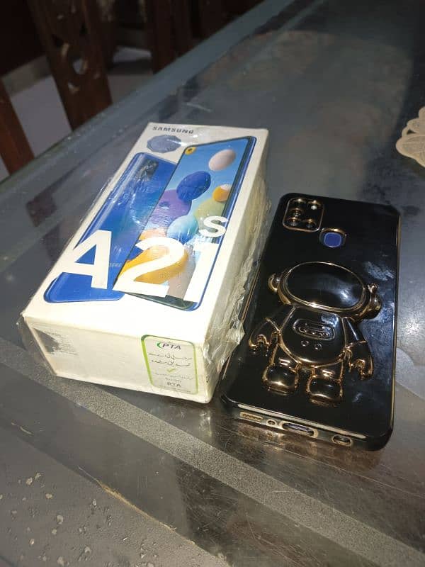 I sell my Mobil  Samsung galaxy A21s  with original  charger. . and box 11