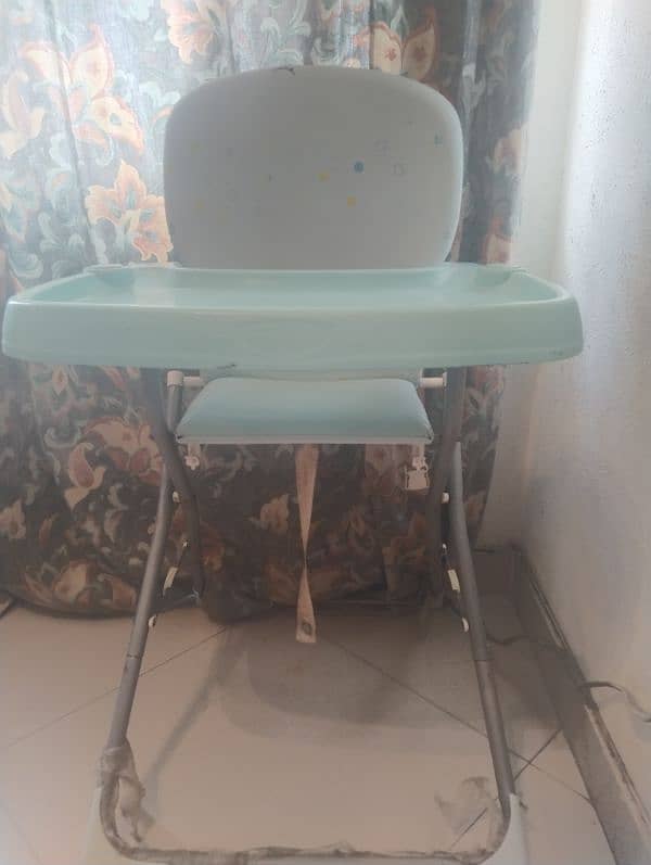 high chair in good condition 0