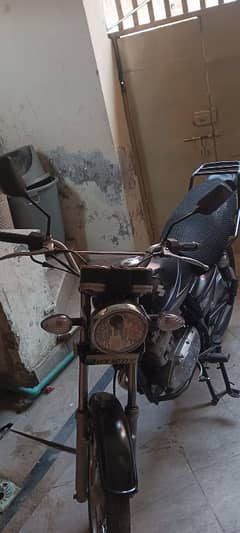 Suzuki gs 150 price fix hai pics mai ap dekh sakty hai