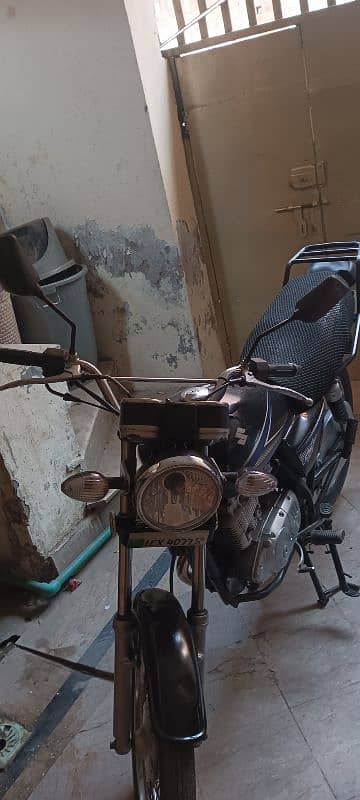 Suzuki gs 150 price fix hai pics mai ap dekh sakty hai 0