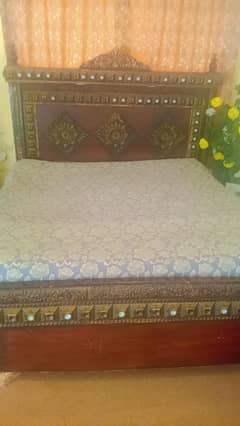 king size bed with two side table