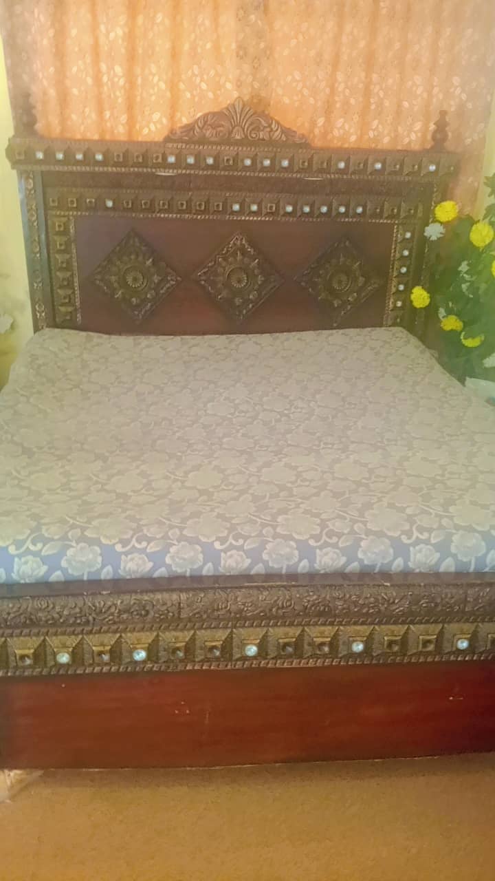 king size bed with two side table 0