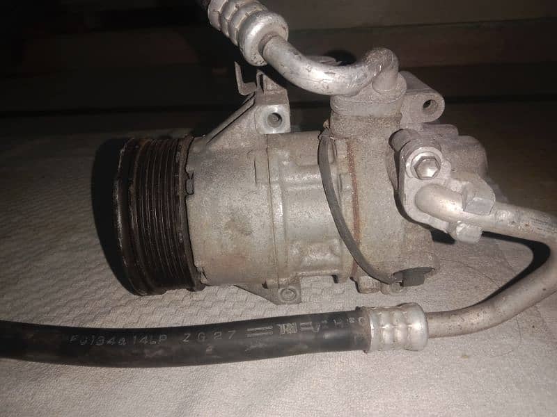 Vitz 2014modal Ac compressor used 2