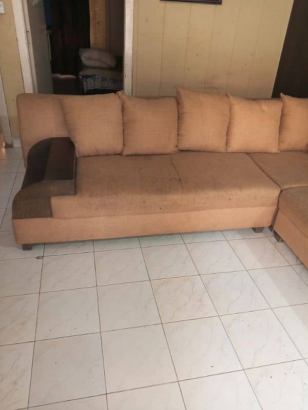 L-shaped 8 seater sofa for sale. Condition 8/10. 2