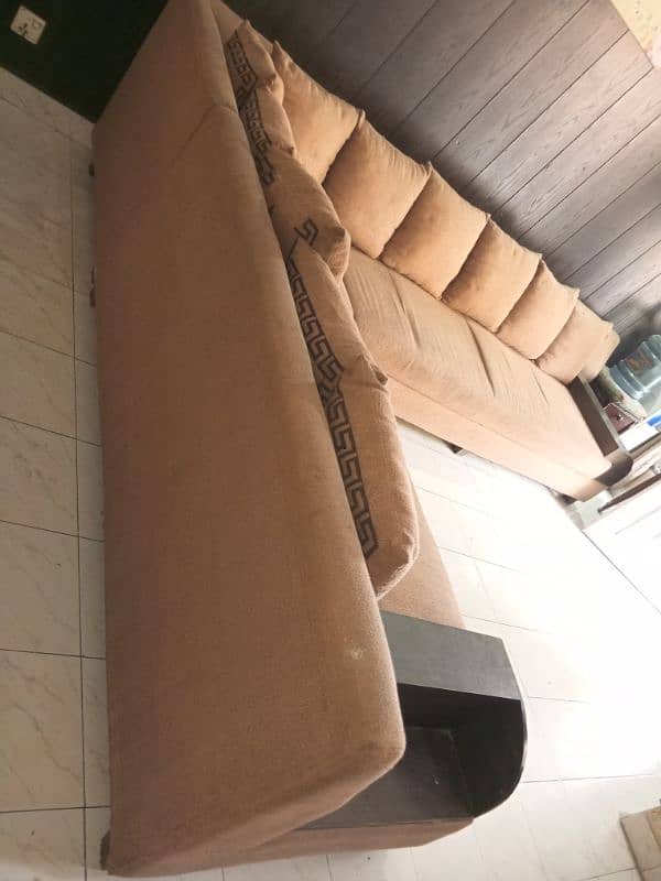 L-shaped 8 seater sofa for sale. Condition 8/10. 4