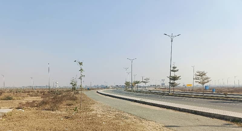 150 FEET ROAD 1 KANAL PLOT FOR SALE IN DHA PHASE 9 PRISM BLOCK M BULEVARD 1