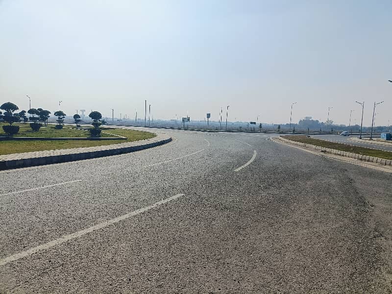 150 FEET ROAD 1 KANAL PLOT FOR SALE IN DHA PHASE 9 PRISM BLOCK M BULEVARD 2