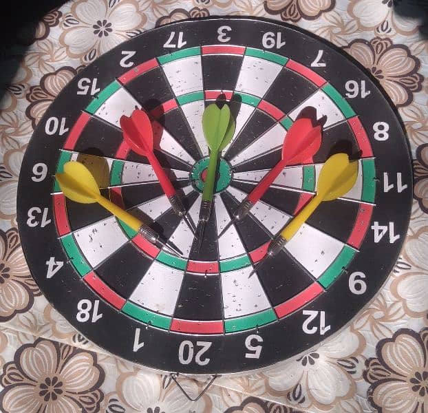 one second hand carram board and one second hand dart board 6