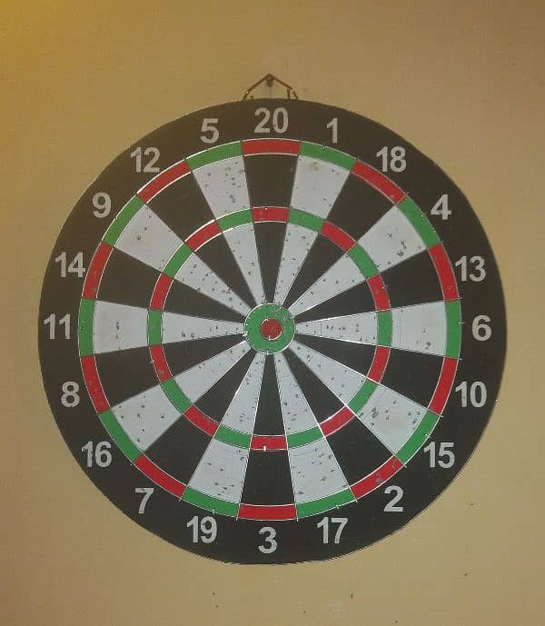 one second hand carram board and one second hand dart board 8