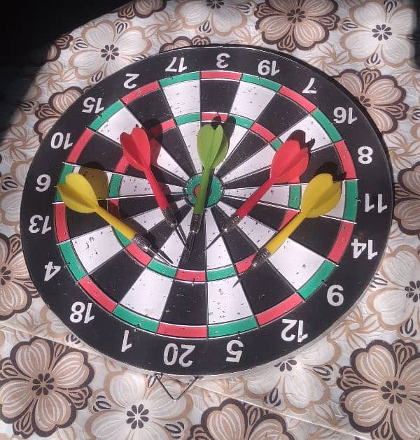 one second hand carram board and one second hand dart board 11