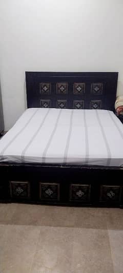 wooden sheet bed