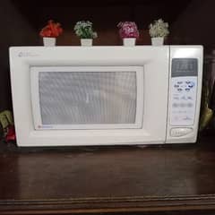 Full size Dawlance microwave for sale in good condition