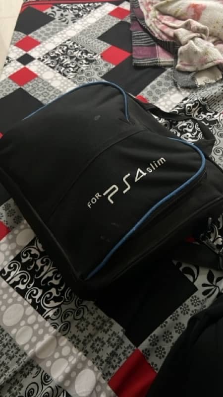 PS4 Slim model 512 GB with Two Controllers and Ps4 Bag 7