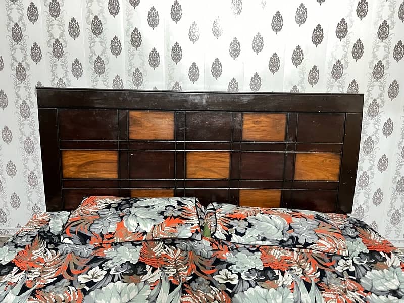 wooden bed with mattress 0