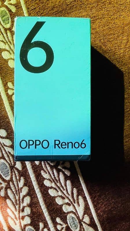 Oppo Reno 6 mobile and box 6