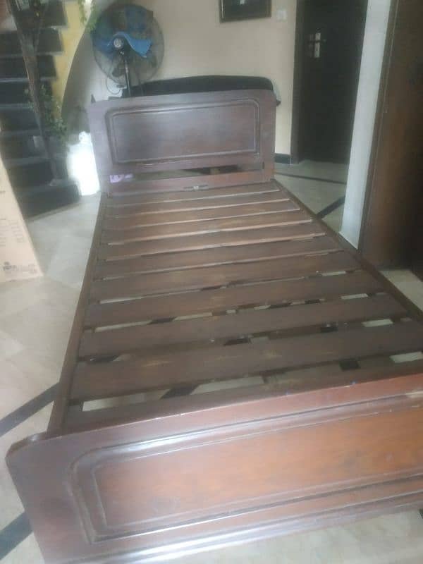 wooden bed set rarely used 0