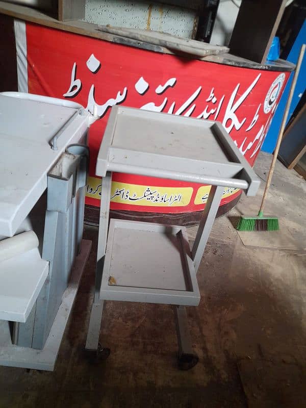 clinic sman urgent sale ultrasound trolly beds Dr counter etc 7