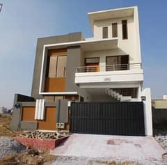 8 Marla house for Sale in Mumtaz City, Islamabad Chenab Block Luxury 5-Bedroom House with Parking & All Facilities in Mumtaz City